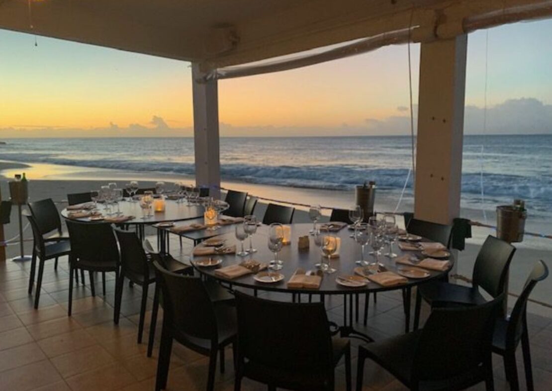 outdoor dining with seafront views with Mango's Seaside Grill