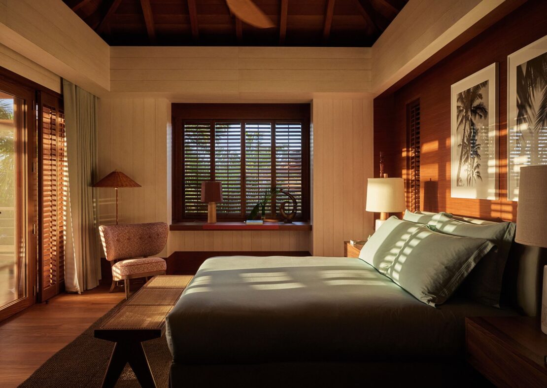 Private suite with modern wooden decor and luxury features at Villa Nyx